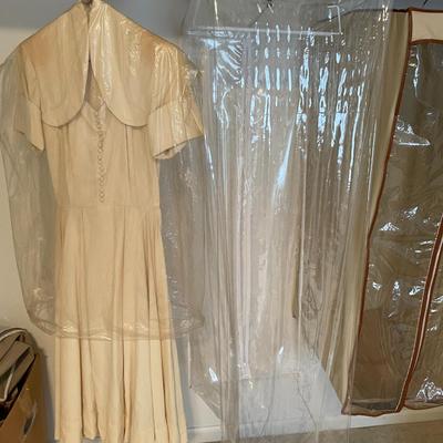 Sale Photo Thumbnail #568: Vintage weedding dress with clothing hanging bags 