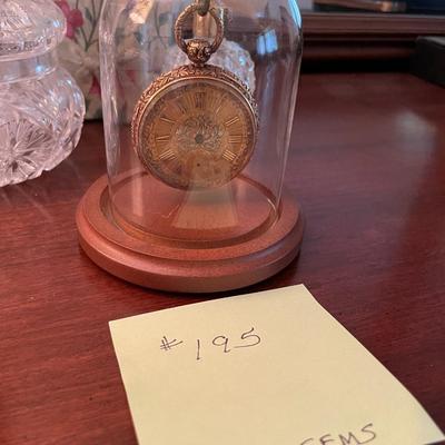Sale Photo Thumbnail #594: Antique pocketwatch (no hands) with holder, crystal glass container, perfume bottle
