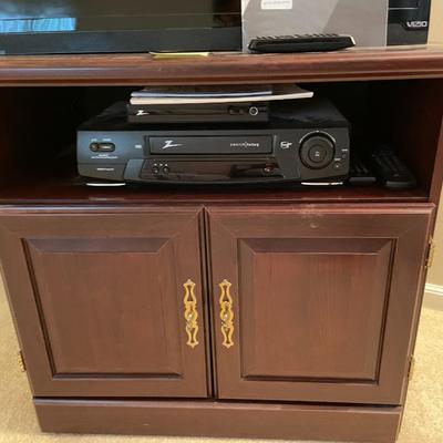 Sale Photo Thumbnail #612: Vizio TV with external antenna, tv stand, zenith DTV tuner and VHS player