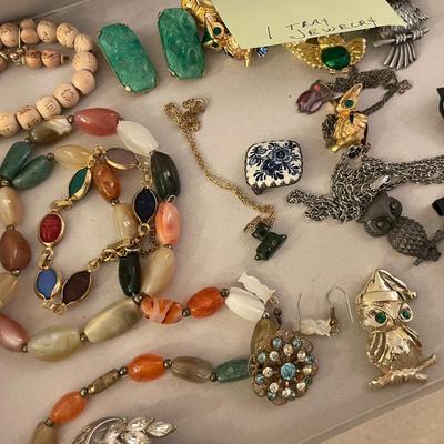 Sale Photo Thumbnail #621: 1 tray of asst. jewelry, pins, braclets, etc