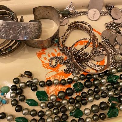 Sale Photo Thumbnail #635: Asst Silver type necklaces and bracelets 
