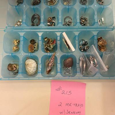Sale Photo Thumbnail #654: 2 Ice Trays filled with costume jewelry - pins, earring and pendants