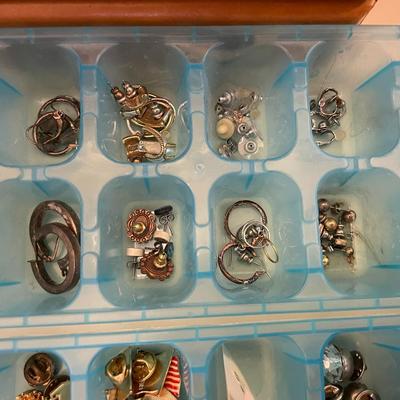 Sale Photo Thumbnail #656: 2 Ice Trays filled with costume jewelry - pins, earring and pendants