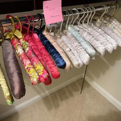 Sale Photo Thumbnail #692: Large assortment of silk padded hangers 