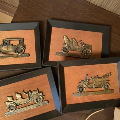 Sale Photo Thumbnail #718: MCM Coffee Table, 1900's Old Car Model Plaques, Hi-Fi AM/FM Radio includes lot of 4 plaques, radio works