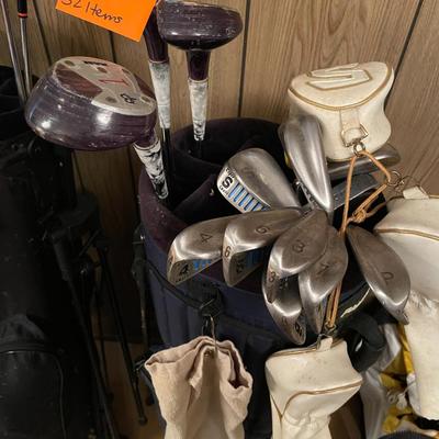 Sale Photo Thumbnail #749: Golf Set #2 includes various brands of golf balls, tees, clubs, sock covers