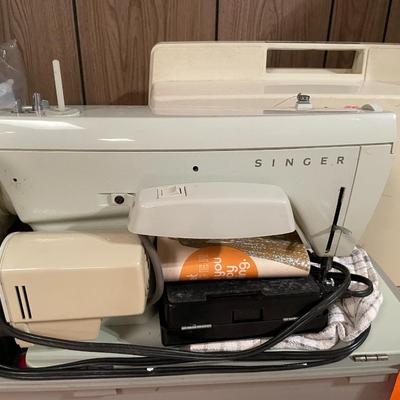 Sale Photo Thumbnail #761: Sewing Supplies includes Fashion Mate by Singer sewing machine, ironing board, fabric, & pillow insert