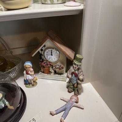 Sale Photo Thumbnail #251: Shelf clock
Figurines
Glass bottles
Vases