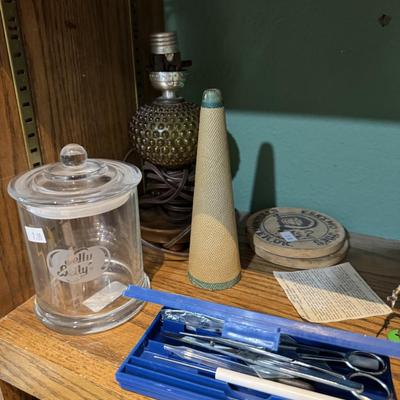 Sale Photo Thumbnail #450: Jar
Shot glasses
Metal bear
Candle