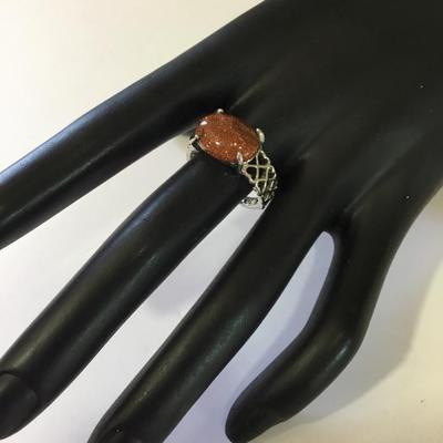 Silver toned fashion ring with stone