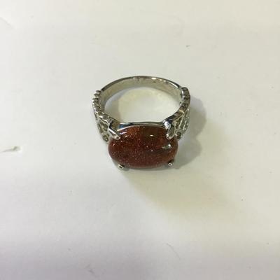 Silver toned fashion ring with stone