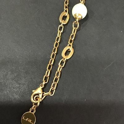 Gold tone necklace with faux pearl beads