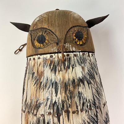 Sale Photo Thumbnail #1209: Double-sided Decoy Nailed Wooden Slats
Wrought iron beaks and leather ears
27.5" high 
on rusted chair