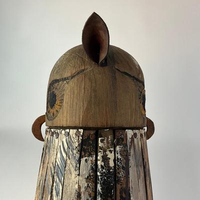 Sale Photo Thumbnail #1208: Double-sided Decoy Nailed Wooden Slats
Wrought iron beaks and leather ears
27.5" high 
on rusted chair