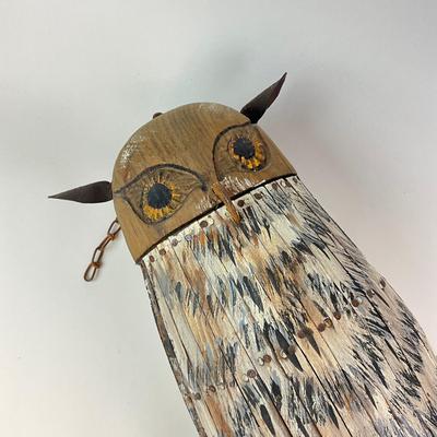 Sale Photo Thumbnail #1211: Double-sided Decoy Nailed Wooden Slats
Wrought iron beaks and leather ears
27.5" high 
on rusted chair