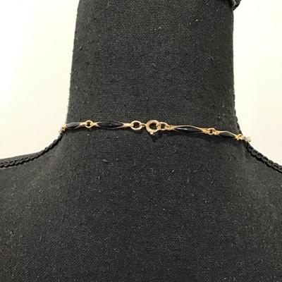 Vintage, gold, toned, black enamel necklace in excellent condition