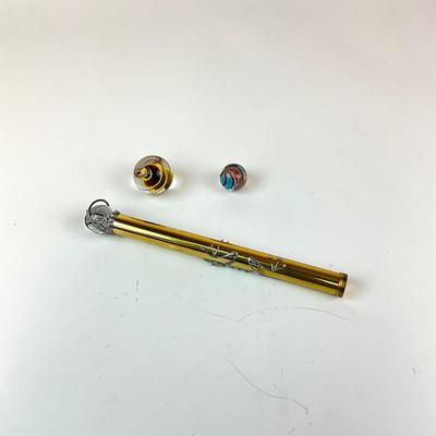 Sale Photo Thumbnail #1228: Includes 3 marbles
Measures: 8" long