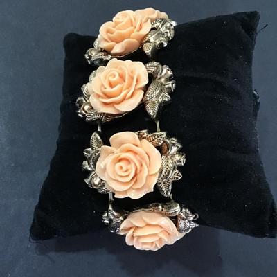 Gold tone, stretch, fashion statement bracelet with roses