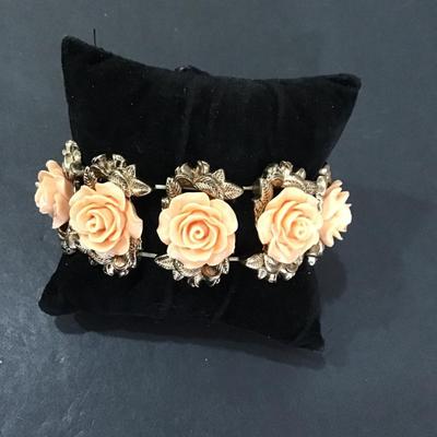 Gold tone, stretch, fashion statement bracelet with roses