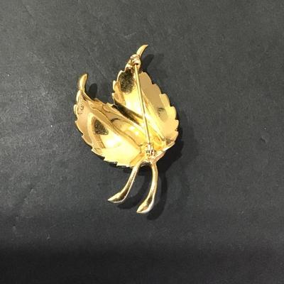 Gold tone, leaf pin with rhinestones