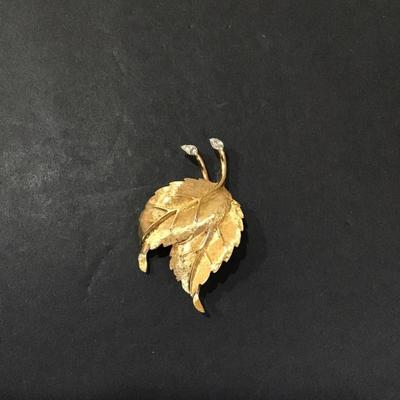 Gold tone, leaf pin with rhinestones