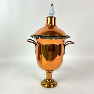 Sale Photo Thumbnail #1298: Has patina around top with porcelain knobs
Measures: 17" high x 10" diameter