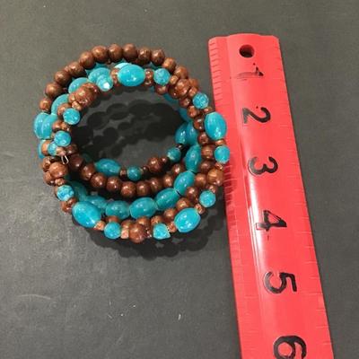 Polished blue glass beads and wood beaded bracelet