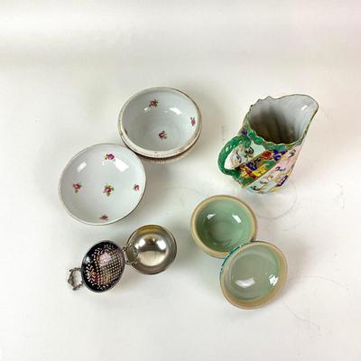 Sale Photo Thumbnail #1311: Total of 4 items
Comes with tall floral porcelain pitcher, two decor porcelain box bowls, one Mappin & Webb plate piece