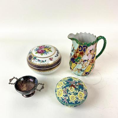 Sale Photo Thumbnail #1309: Total of 4 items
Comes with tall floral porcelain pitcher, two decor porcelain box bowls, one Mappin & Webb plate piece