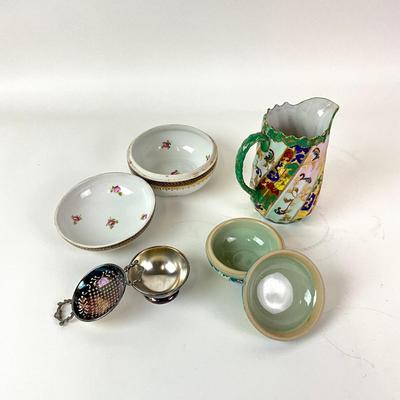 Sale Photo Thumbnail #1312: Total of 4 items
Comes with tall floral porcelain pitcher, two decor porcelain box bowls, one Mappin & Webb plate piece