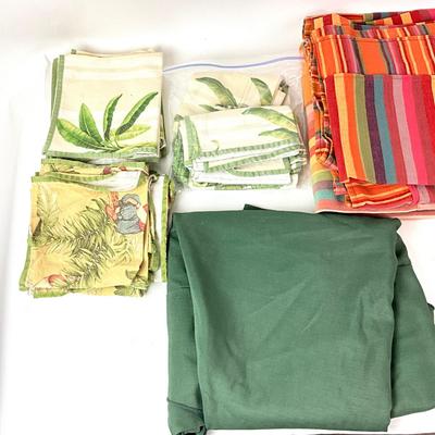 Sale Photo Thumbnail #1319: Total of seven linens
One large green table linen
Large green round table linen measures: 72" diameter
Smallest linen measures: 15" square