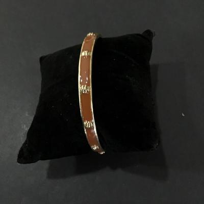 Gold tone, Marlyn shiff cuff with light brown enamel
