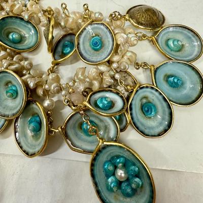 Sale Photo Thumbnail #414: Limpet Shells and fresh water pearls.  Good condition.