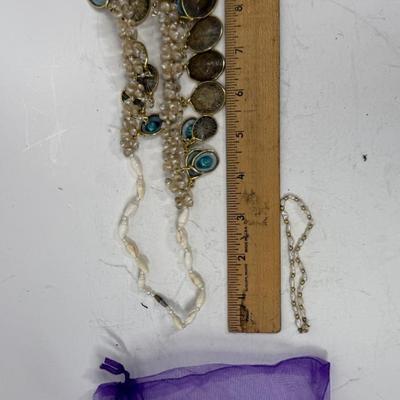 Sale Photo Thumbnail #409: Limpet Shells and fresh water pearls.  Good condition.