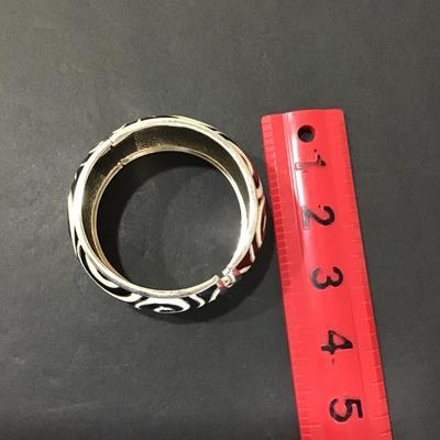 SilverTone hinged cuff with cream and black enamel