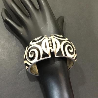 SilverTone hinged cuff with cream and black enamel