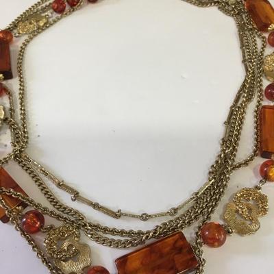 Very nice vintage Multi layered, gold toned, Baltic amber bead statement necklace