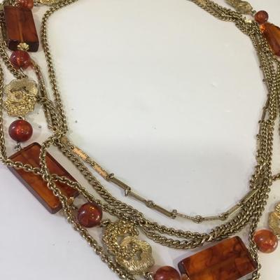 Very nice vintage Multi layered, gold toned, Baltic amber bead statement necklace
