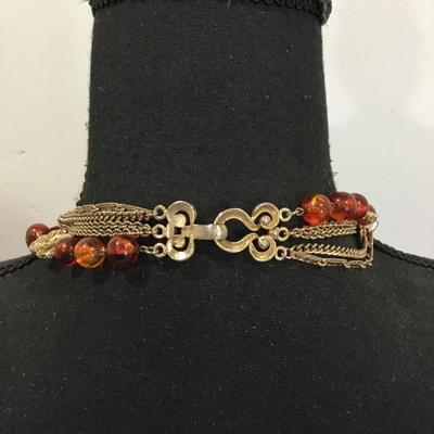Very nice vintage Multi layered, gold toned, Baltic amber bead statement necklace