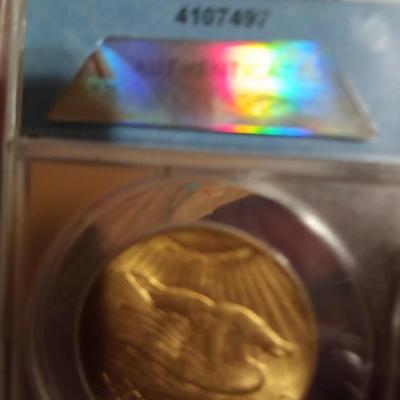 Sale Photo Thumbnail #3: The product is a 1925 $20 Saint Gaudens Gold D,ouble E,agle MS62 co,in, graded by ANACS. This uncirculated c oin is composed of 0.9 fineness gold and was struck as a business strike in Philadelphia. A valuable piece of US coinage from the pre-1933 era, th
