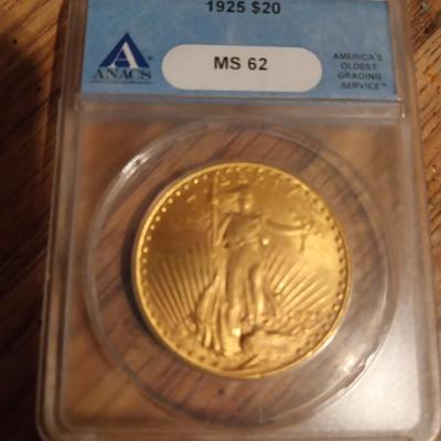 Sale Photo Thumbnail #8: The product is a 1925 $20 Saint Gaudens Gold D,ouble E,agle MS62 co,in, graded by ANACS. This uncirculated c oin is composed of 0.9 fineness gold and was struck as a business strike in Philadelphia. A valuable piece of US coinage from the pre-1933 era, th