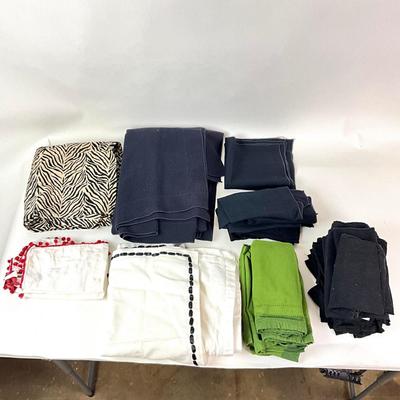 Sale Photo Thumbnail #1332: Comes With Zebra Print linen and other dark table linens
Dark Navy Blue Linen measures: 10' long x 5'5" wide