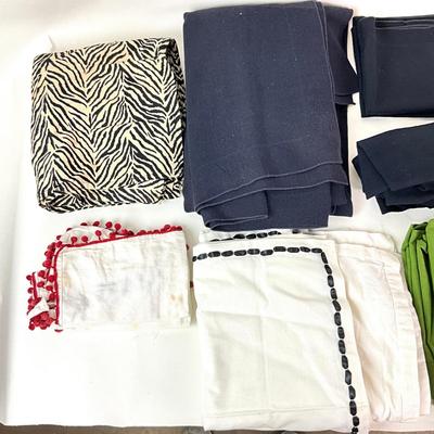 Sale Photo Thumbnail #1331: Comes With Zebra Print linen and other dark table linens
Dark Navy Blue Linen measures: 10' long x 5'5" wide