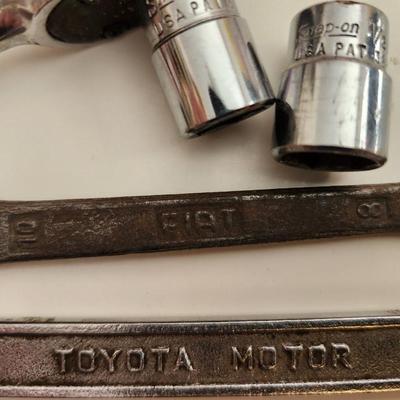 Sale Photo Thumbnail #166: This auction lot is for a grouping of Vintage Tools Plus.  In this grouping you will find an early wrench with the name Ford forged in the handle, another has the brand 'Fiat" and another has "Toyota" marked on it.  Also included is a Snap-on ratchet with