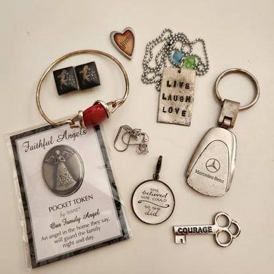 Sale Photo Thumbnail #185: This auction lot is for what is Still in the Jewelry Box.  This gathering offers a pair of Siamese-style earrings, a small token heart, a Mercedes key fob, a Courage Key, a nifty pair of Cubic Zirconia earrings, a stainless steel chain with a slogan penda