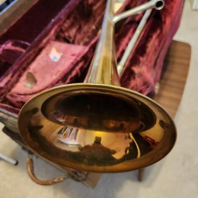 Sale Photo Thumbnail #190: This auction lot is for a Vintage Olds Super Trumpet.  This wonderfully unique musical instrument has seen a few blue notes. The previous owner was in a touring Jazz Band.  It has been stored for at least 40 years.  This trumpet was manufactured by the F.