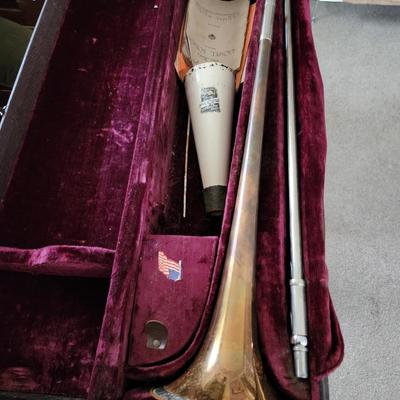 Sale Photo Thumbnail #186: This auction lot is for a Vintage Olds Super Trumpet.  This wonderfully unique musical instrument has seen a few blue notes. The previous owner was in a touring Jazz Band.  It has been stored for at least 40 years.  This trumpet was manufactured by the F.