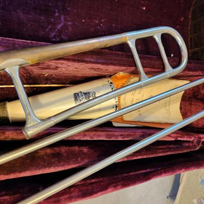 Sale Photo Thumbnail #191: This auction lot is for a Vintage Olds Super Trumpet.  This wonderfully unique musical instrument has seen a few blue notes. The previous owner was in a touring Jazz Band.  It has been stored for at least 40 years.  This trumpet was manufactured by the F.