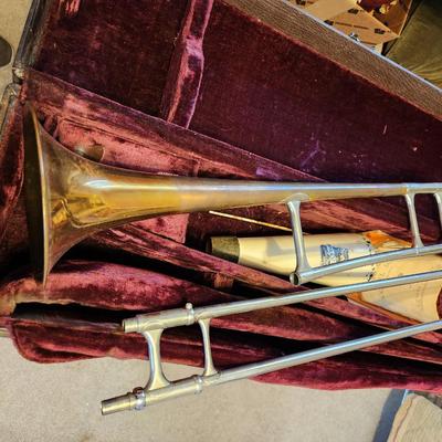 Sale Photo Thumbnail #192: This auction lot is for a Vintage Olds Super Trumpet.  This wonderfully unique musical instrument has seen a few blue notes. The previous owner was in a touring Jazz Band.  It has been stored for at least 40 years.  This trumpet was manufactured by the F.