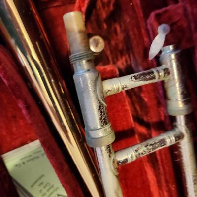 Sale Photo Thumbnail #194: This auction lot is for a Frank Holton & Company Trumpet.  This wonderfully unique musical instrument has seen a few blue notes. The previous owner was in a touring Jazz Band.  It has been stored for at least 40 years.  This trumpet was manufactured by th